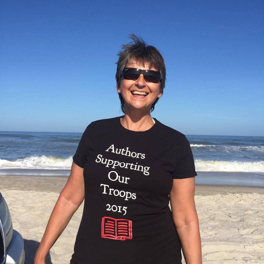 Marianne Sciucco wearing Authors Supporting Our Troops T-shirt at Assateague Island